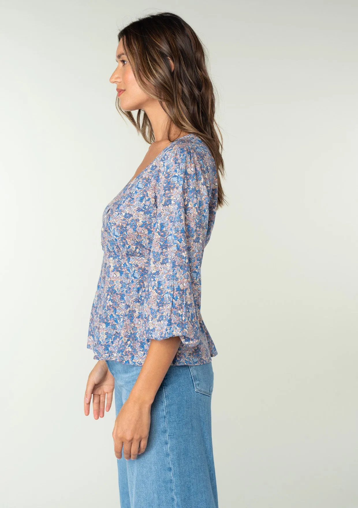 Floral 3/4 Sleeve V Neck Peplum Top