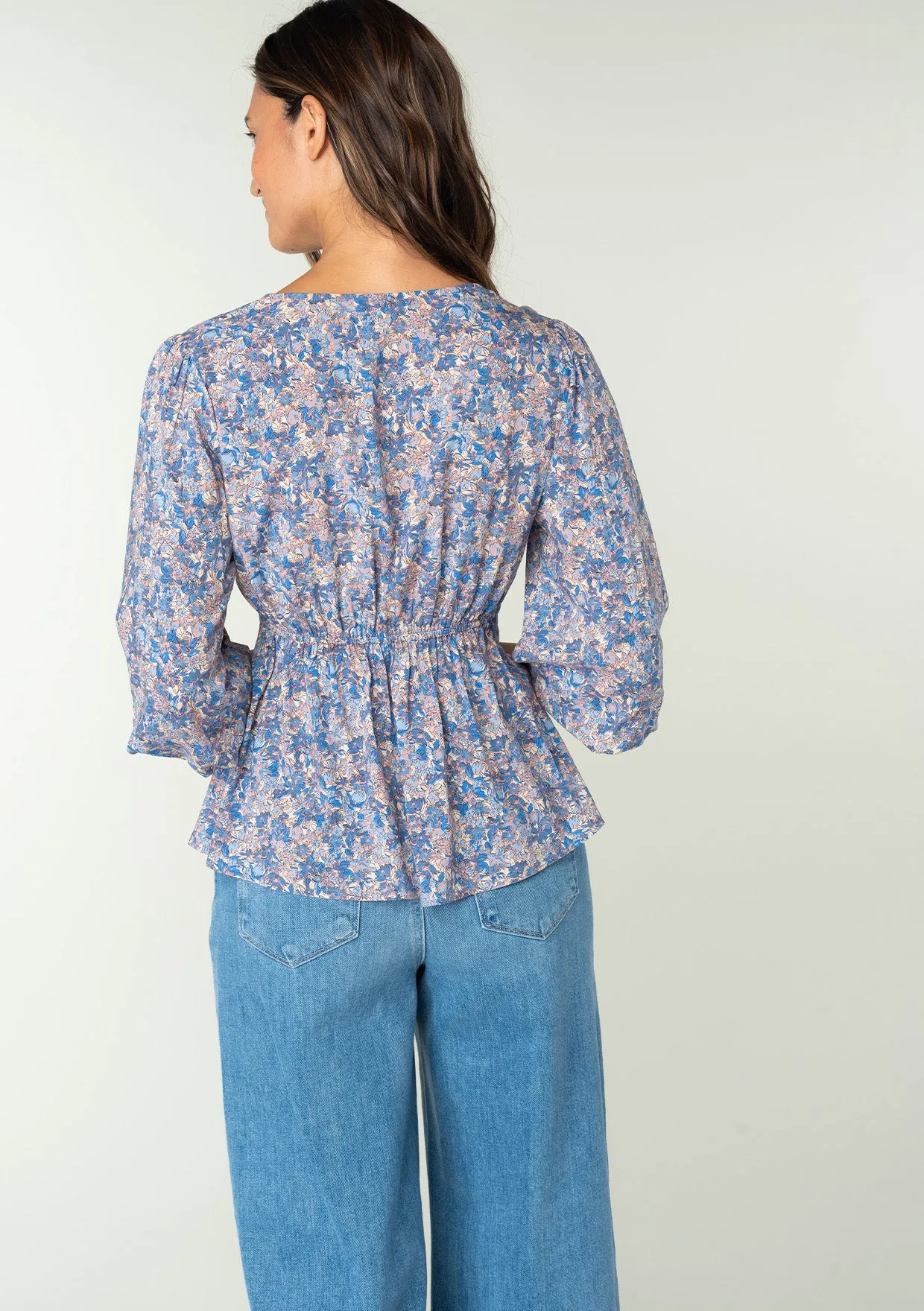 Floral 3/4 Sleeve V Neck Peplum Top