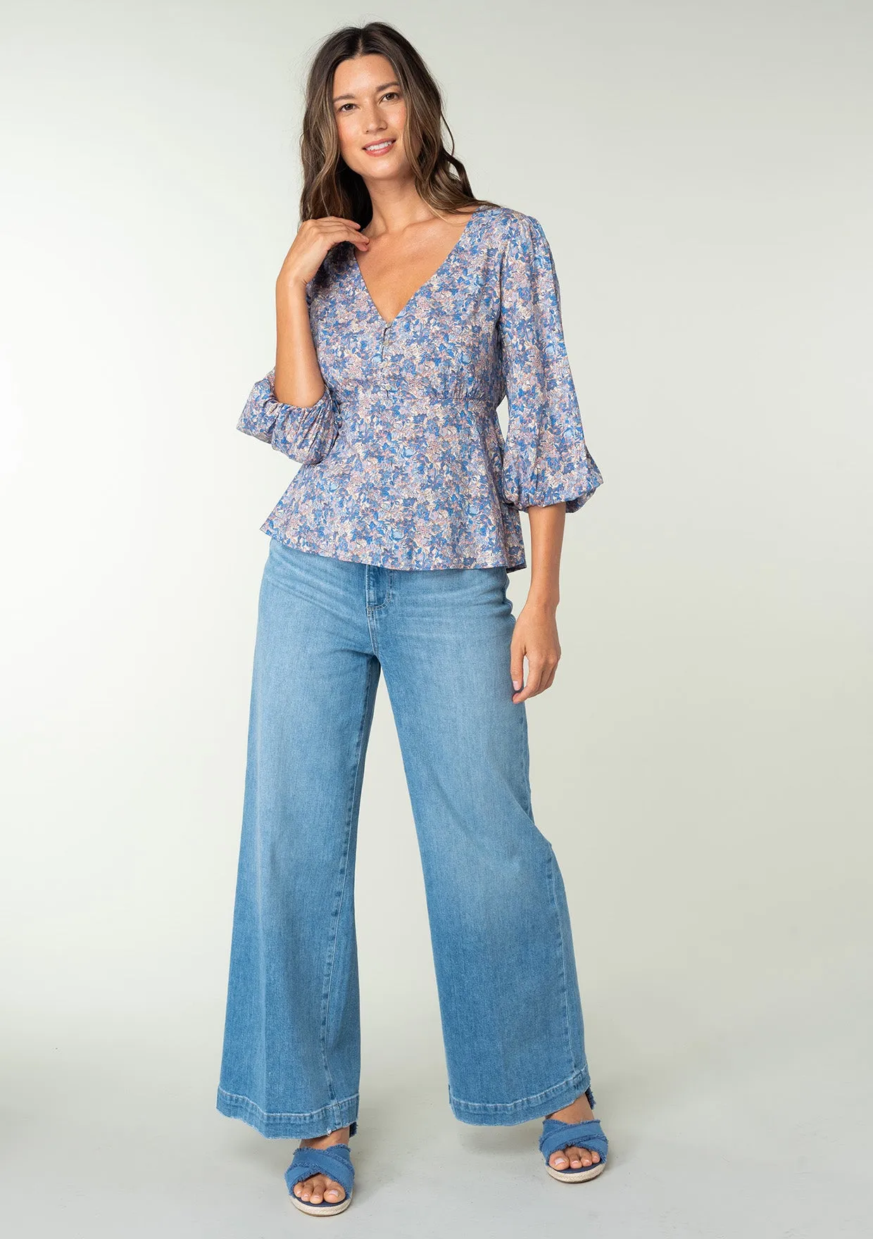 Floral 3/4 Sleeve V Neck Peplum Top