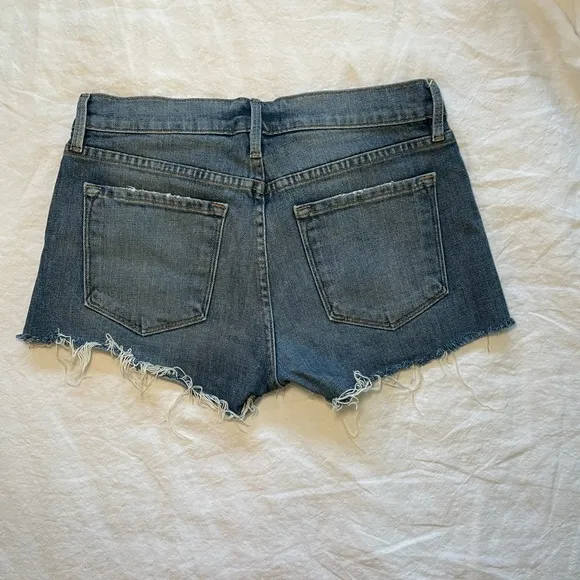 FRAME Denim Le Cutoff Tulip Shorts in Valle