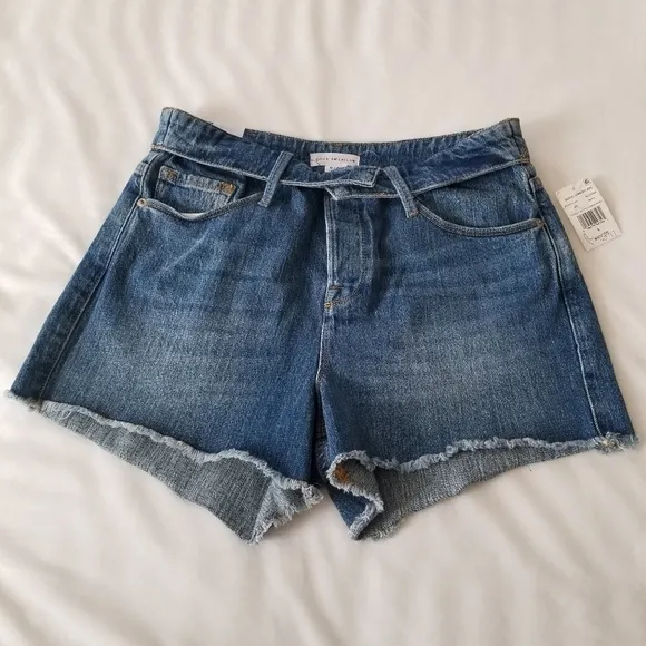 Good American The cut off fold over waist denim shorts