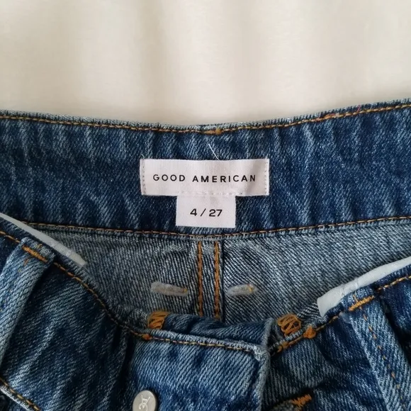 Good American The cut off fold over waist denim shorts