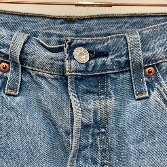 Levi’s 501 distressed denim shorts. size 28