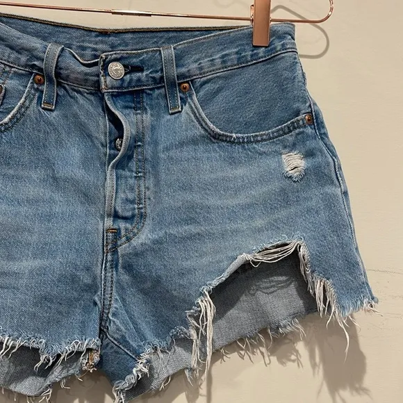 Levi’s 501 distressed denim shorts. size 28