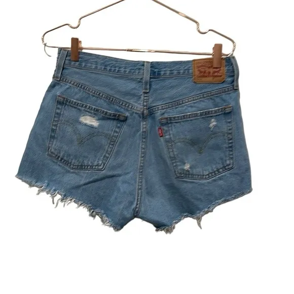 Levi’s 501 distressed denim shorts. size 28