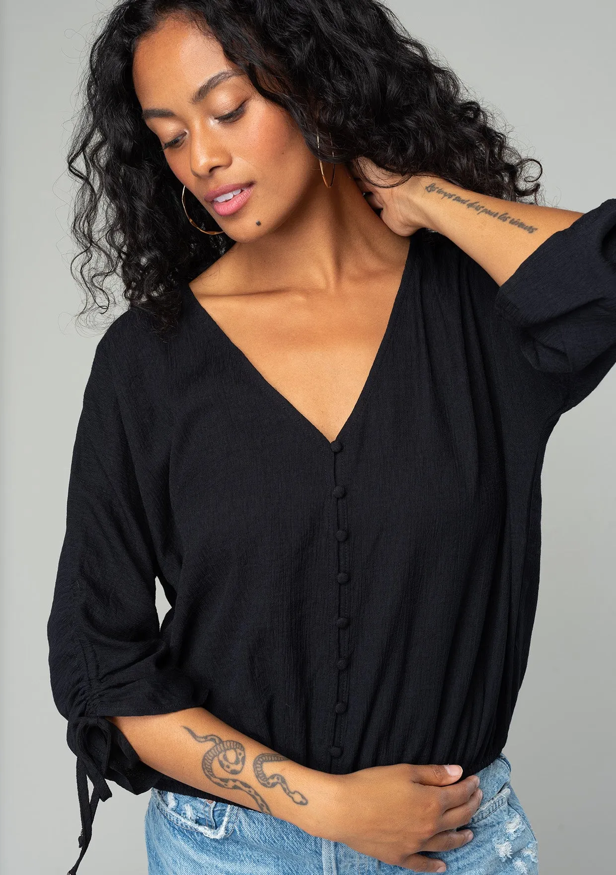 Long Sleeve Ruched Button Down V Neck Top