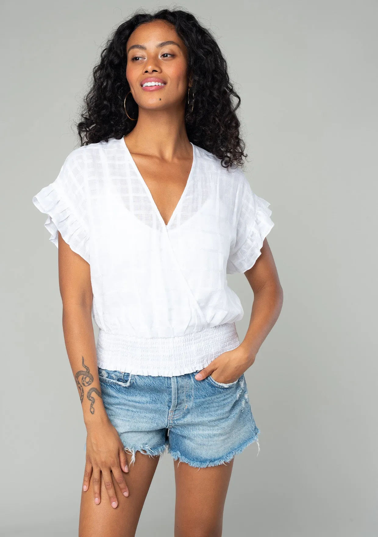 Plaid Surplice Smocked Ruffle Sleeve Top
