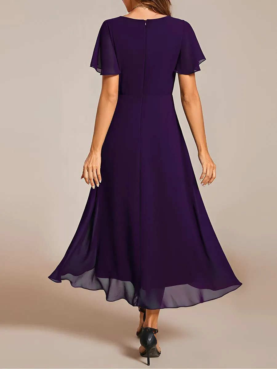 Robe de soirée midi en mousseline plissée à col en V et manches volantées