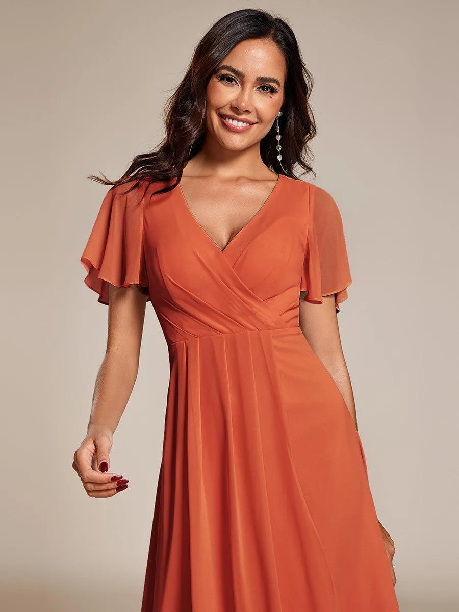Robe de soirée midi en mousseline plissée à col en V et manches volantées