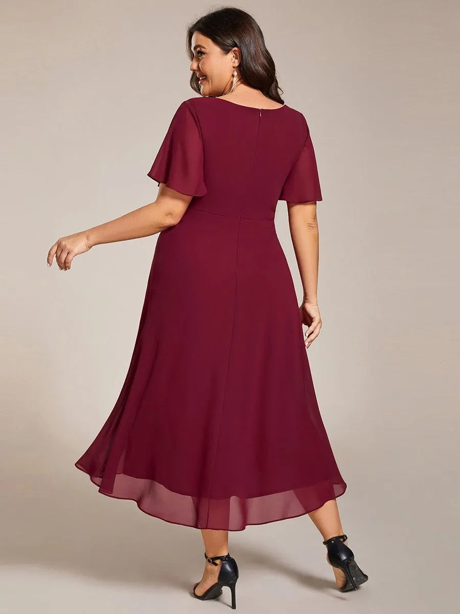 Robe de soirée midi en mousseline plissée à col en V et manches volantées
