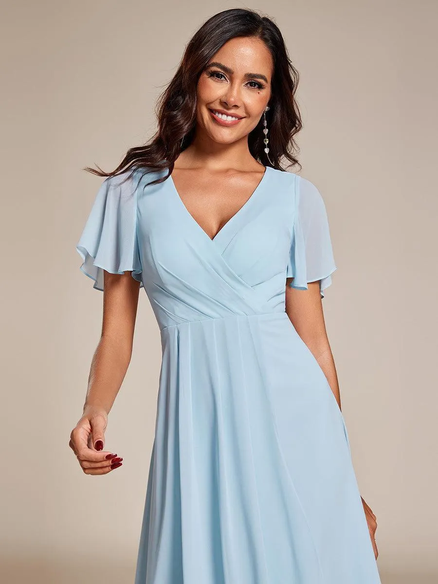 Robe de soirée midi en mousseline plissée à col en V et manches volantées