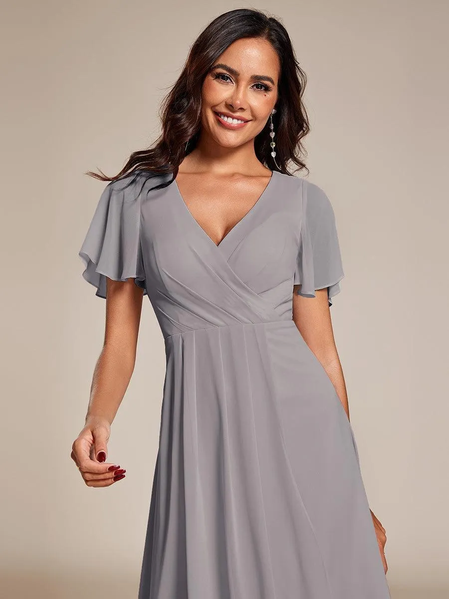 Robe de soirée midi en mousseline plissée à col en V et manches volantées
