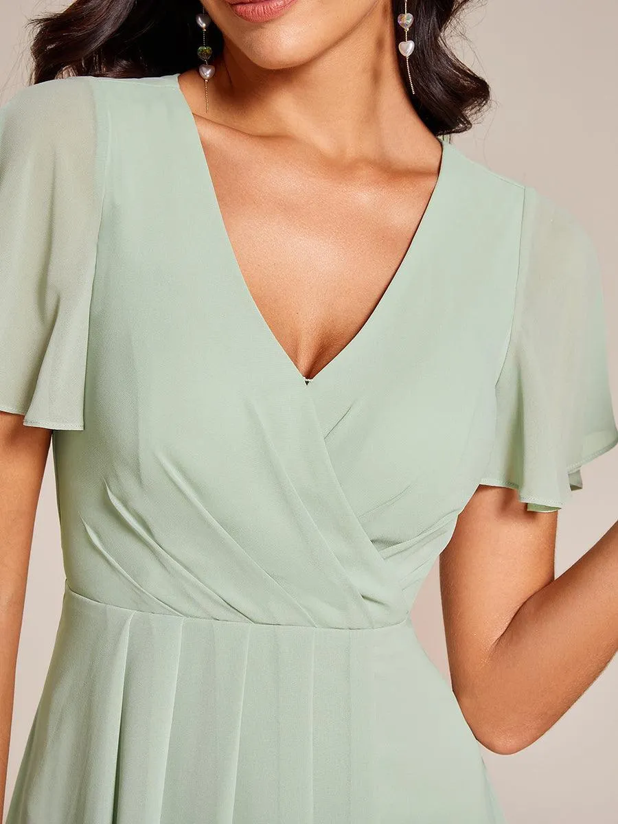 Robe de soirée midi en mousseline plissée à col en V et manches volantées
