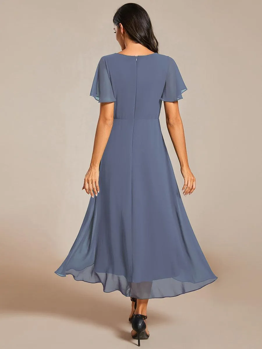 Robe de soirée midi en mousseline plissée à col en V et manches volantées