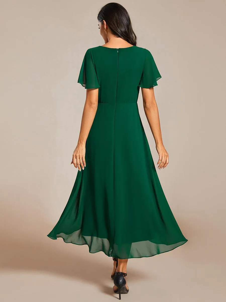 Robe de soirée midi en mousseline plissée à col en V et manches volantées
