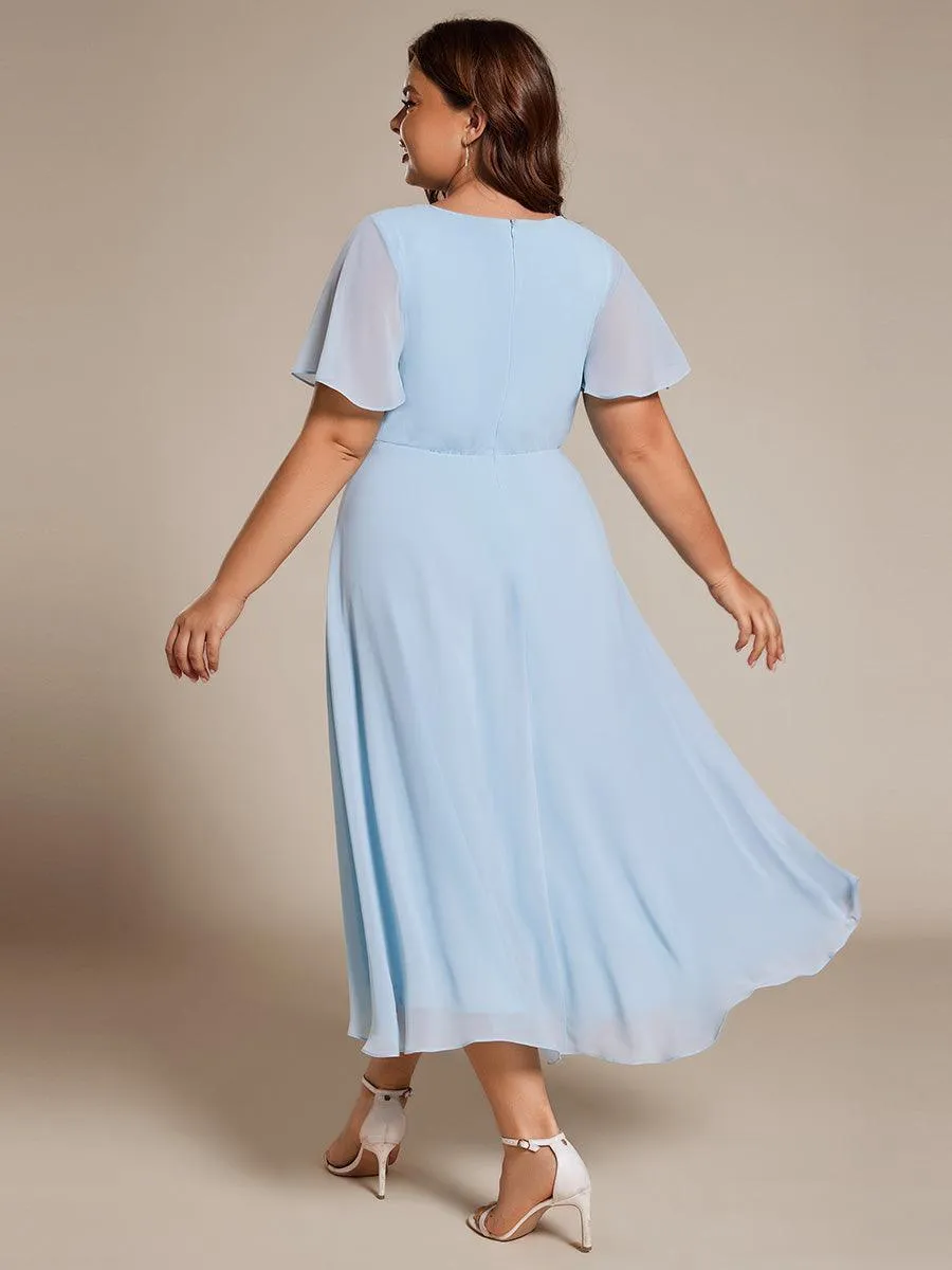 Robe de soirée midi en mousseline plissée à col en V et manches volantées